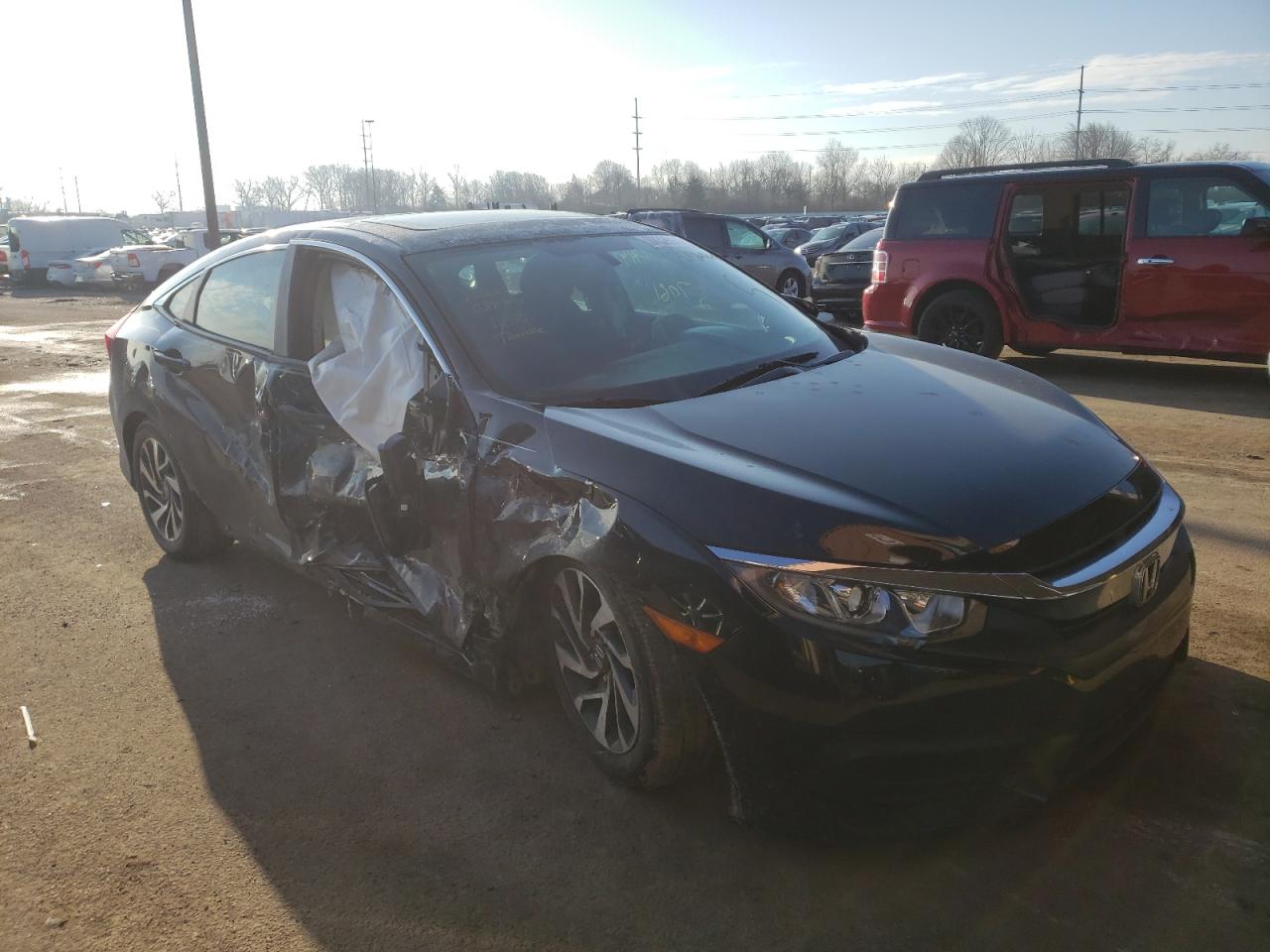 HONDA CIVIC EX 2016 with VIN 19XFC2F72GE073020 - Photo from auction