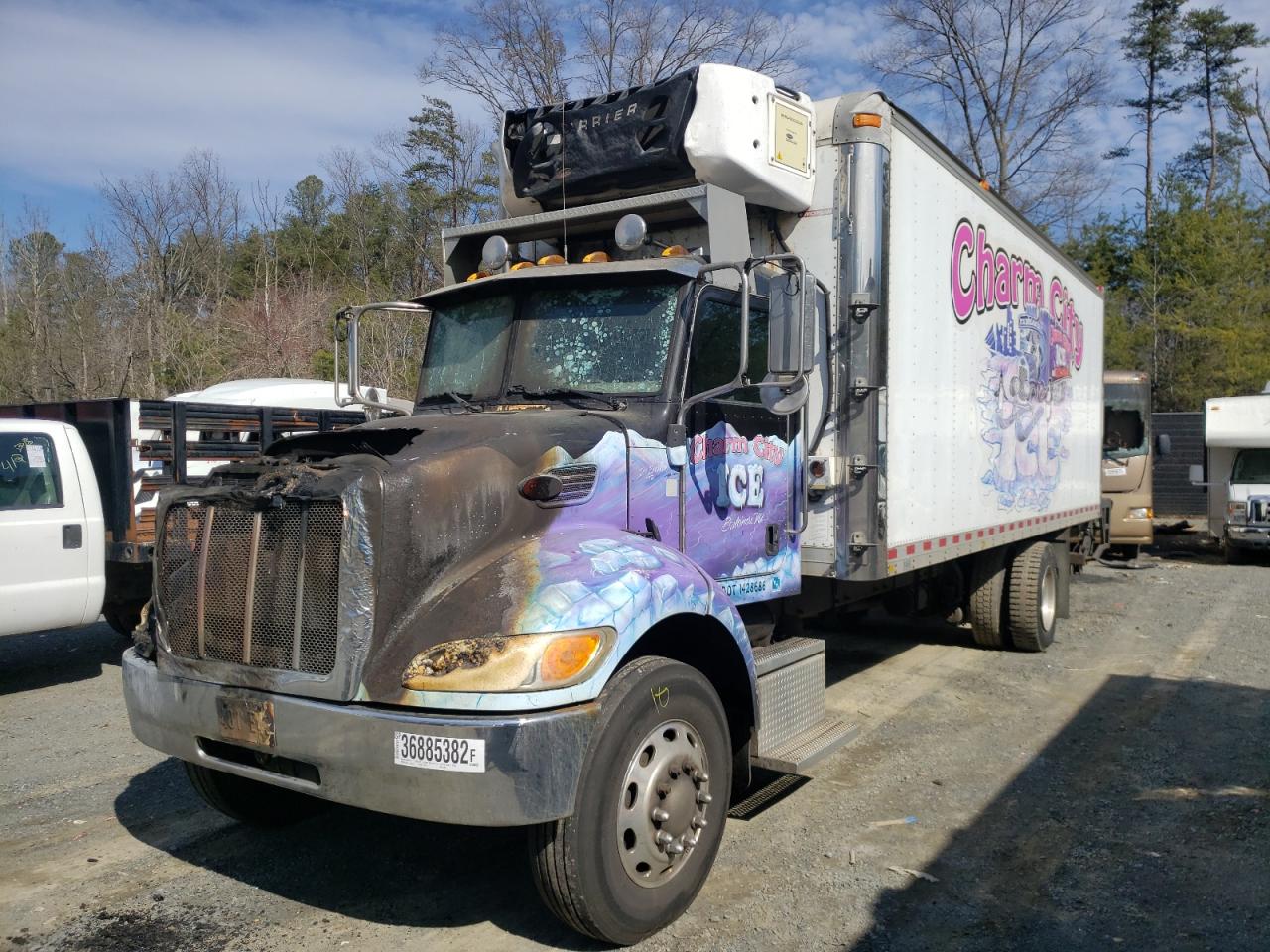 Photo 2 from auction – 2006 PETERBILT 335 with VIN 2NPLHD7X36M630454