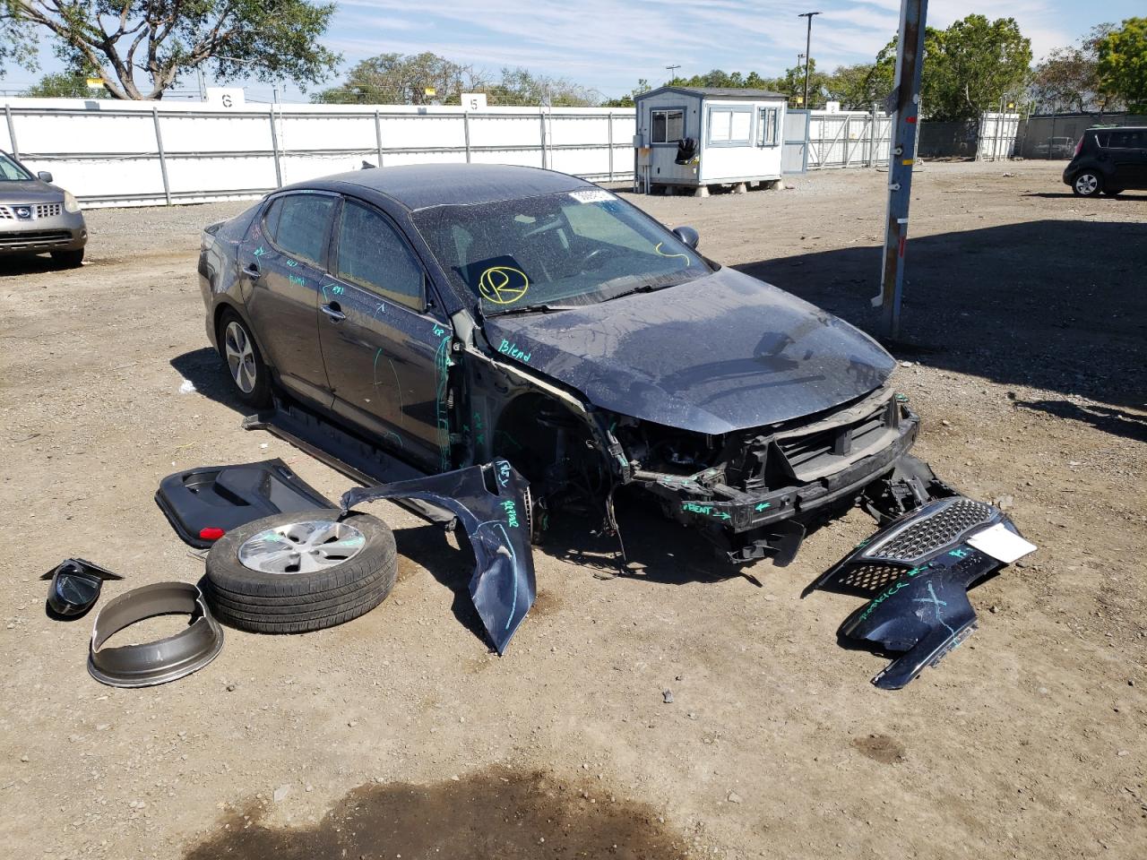 KIA OPTIMA HYB 2015 with VIN KNAGM4AD5F5077709 - Photo from auction