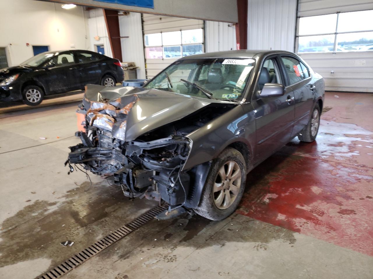 Photo 2 from auction – 2007 KIA OPTIMA LX with VIN KNAGE124575118223