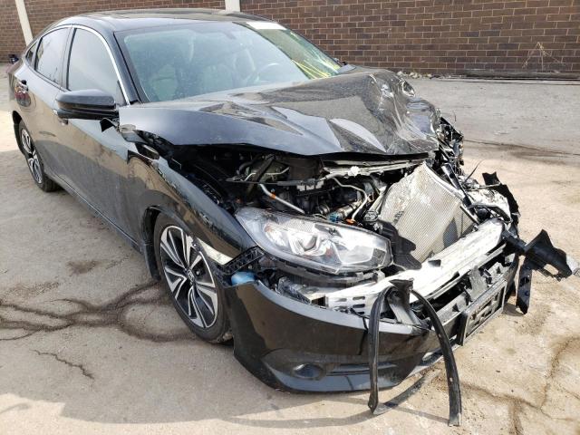 HONDA CIVIC EXL 2017 with VIN 19XFC1F74HE002624 - Photo from auction