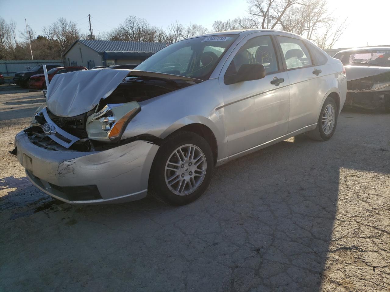 Photo 2 from auction – 2011 FORD FOCUS SE with VIN 1FAHP3FN0BW165636