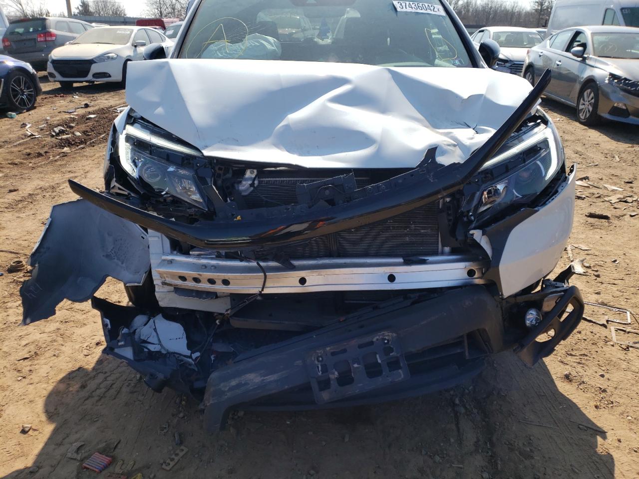 Photo 9 from auction – 2020 HONDA PASSPORT E with VIN 5FNYF8H52LB020689