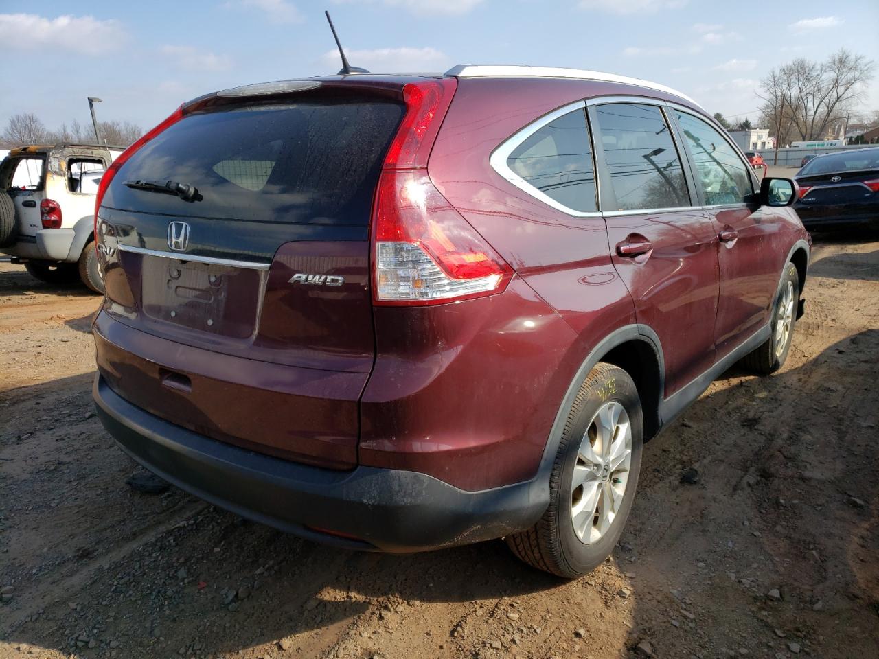Photo 4 from auction – 2014 HONDA CR-V EXL with VIN 5J6RM4H73EL097036