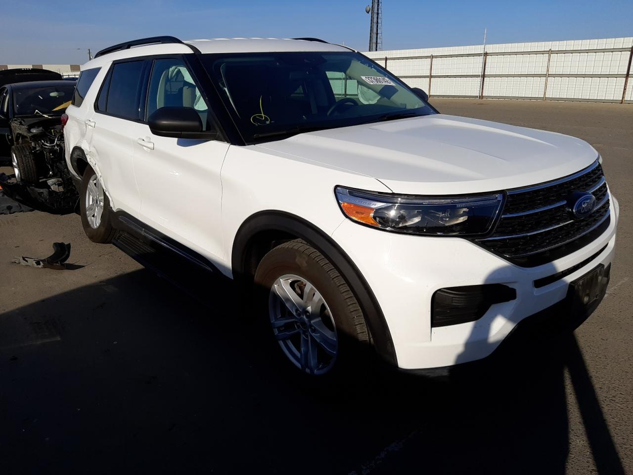 FORD EXPLORER X 2021 with VIN 1FMSK8DH6MGA52680 - Photo from auction