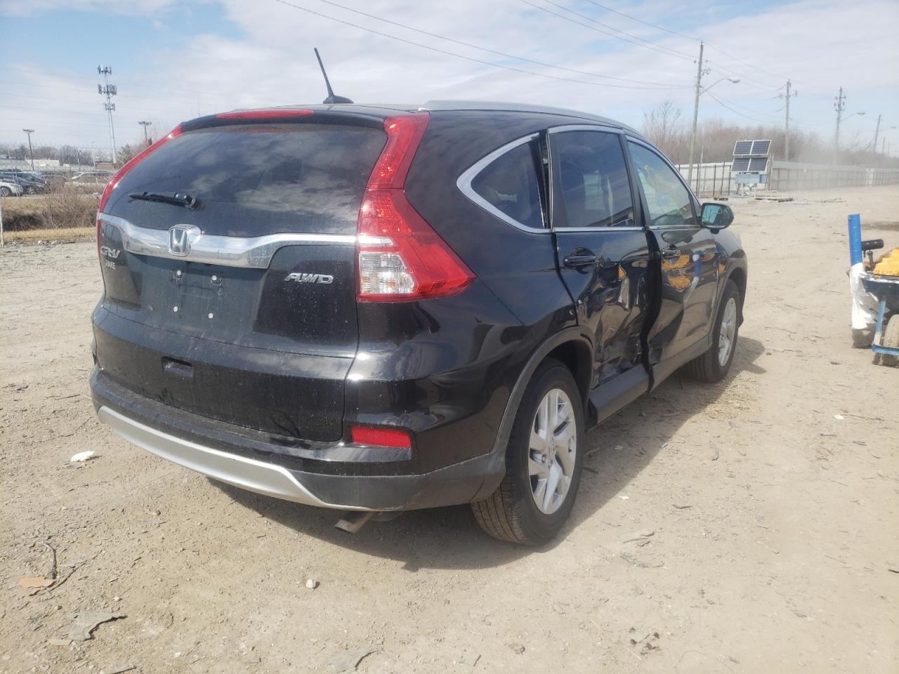 Photo 4 from auction – 2016 HONDA CR-V EXL with VIN 5J6RM4H70GL064577