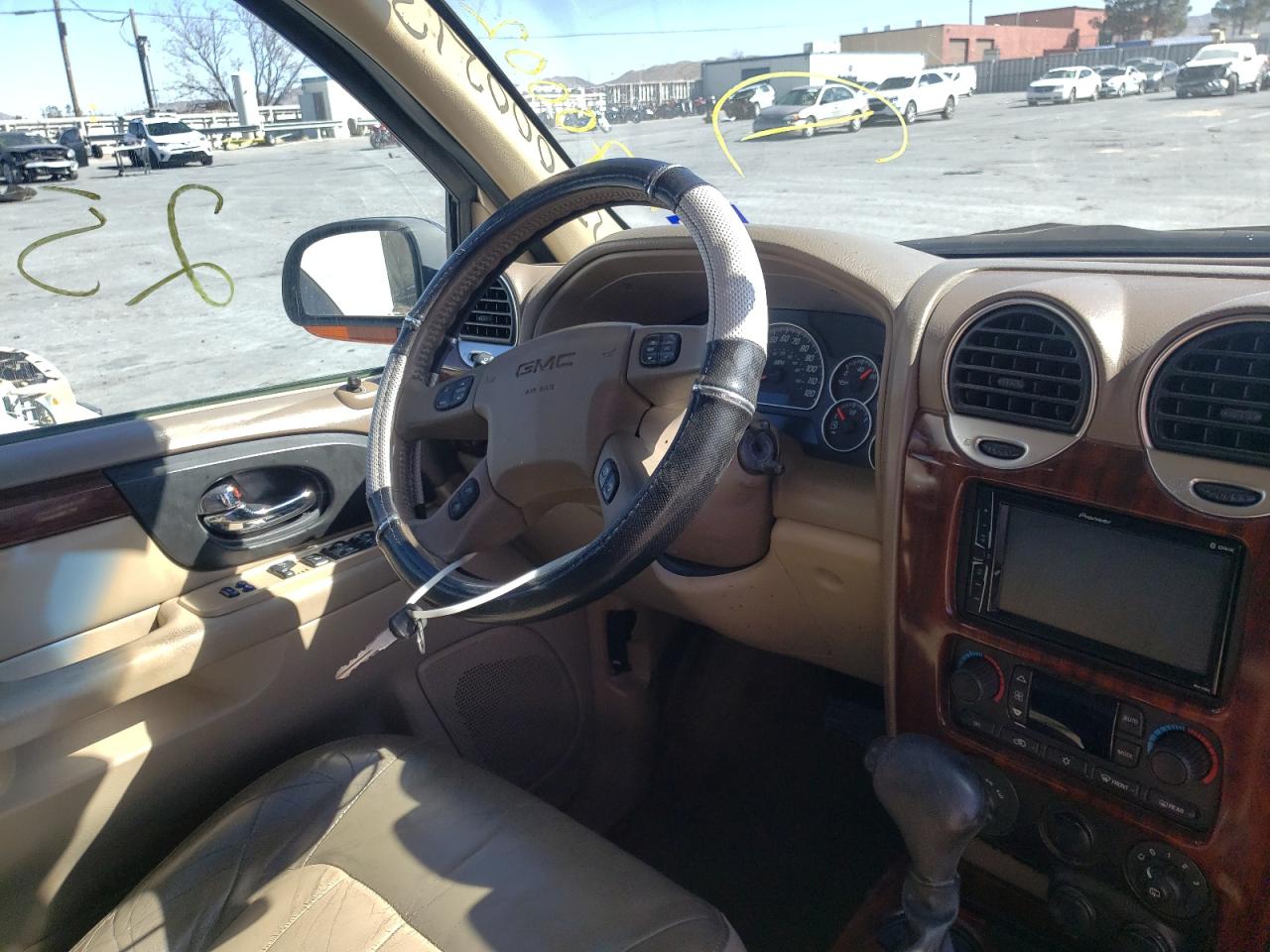 Photo 9 from auction – 2004 GMC ENVOY with VIN 1GKDT13SX42238027