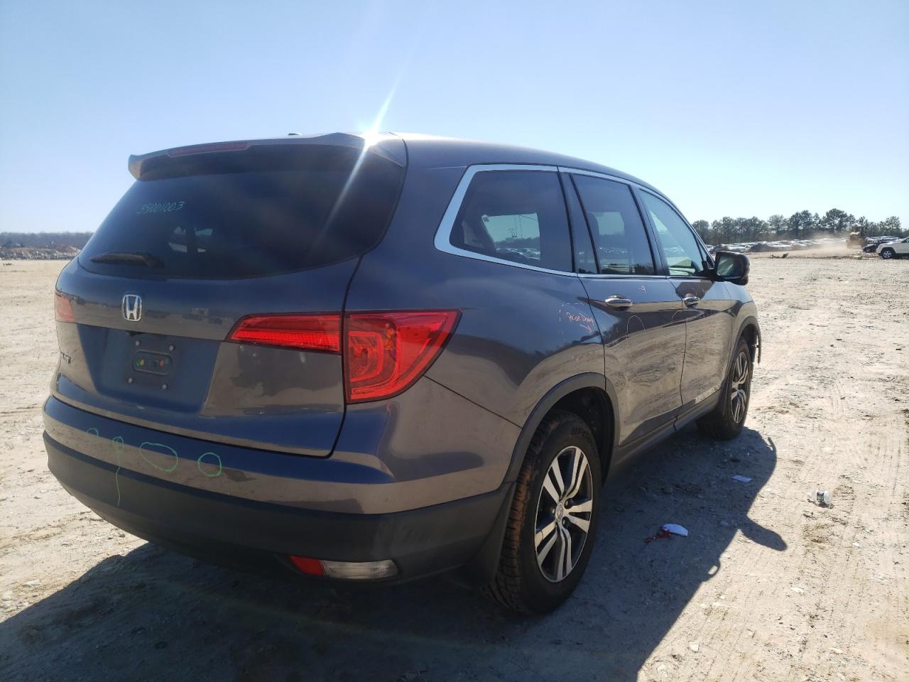 Photo 4 from auction – 2016 HONDA PILOT EXLN with VIN 5FNYF5H72GB020679