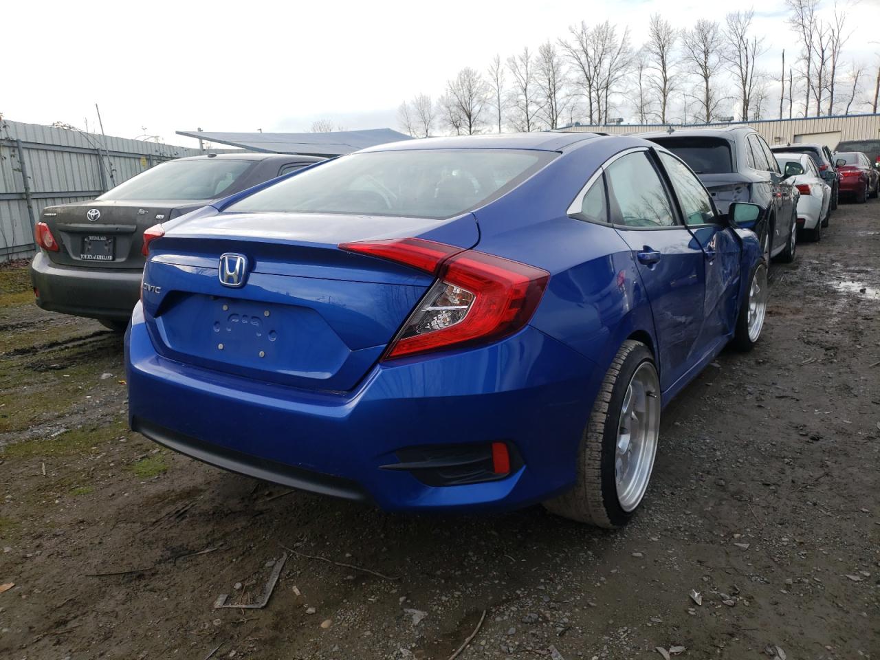 Photo 4 from auction – 2016 HONDA CIVIC LX with VIN 19XFC2F52GE234125