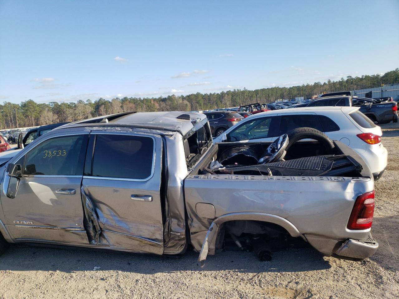 Photo 9 from auction – 2021 RAM 1500 LIMIT with VIN 1C6RREHT3MN575413