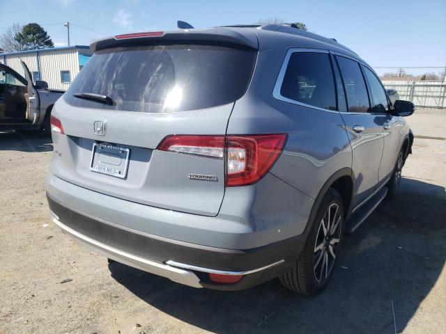 Photo 4 from auction – 2022 HONDA PILOT TOUR with VIN 5FNYF5H61NB014473