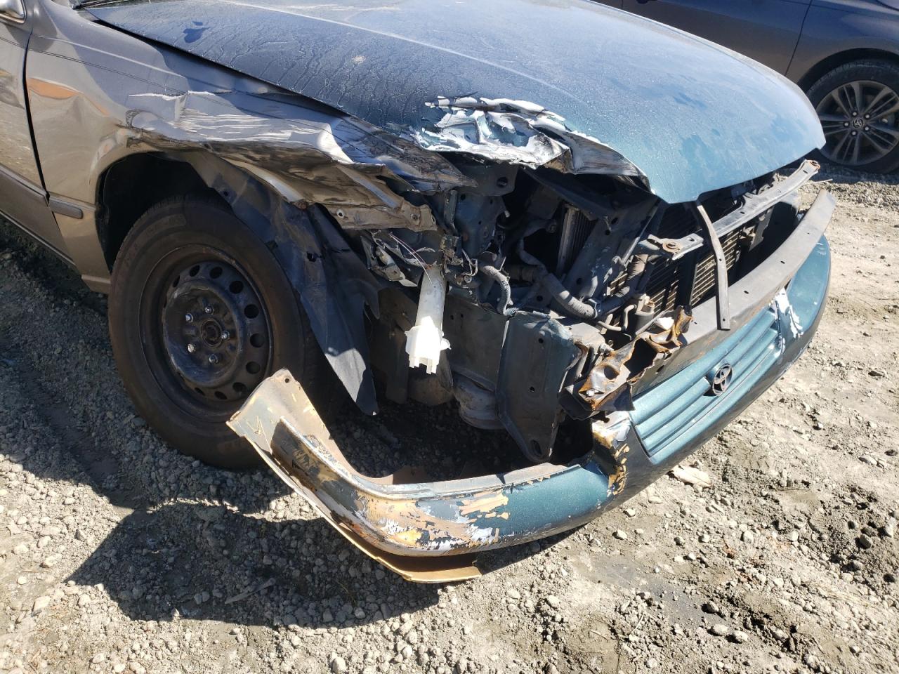 Photo 9 from auction – 1997 TOYOTA CAMRY CE with VIN 4T1BG22K2VU062560
