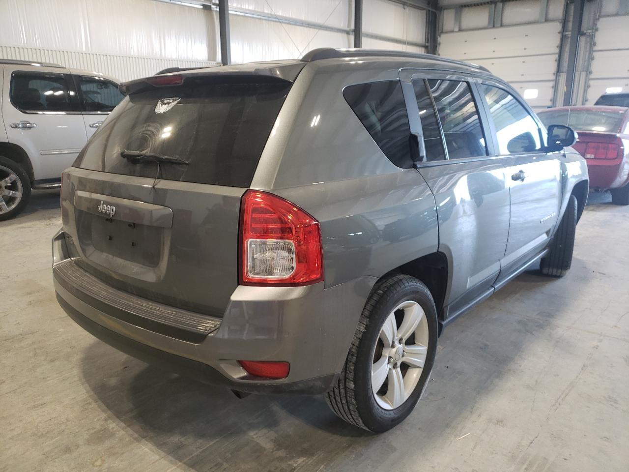 Photo 4 from auction – 2011 JEEP COMPASS SP with VIN 1J4NT1FB2BD195410