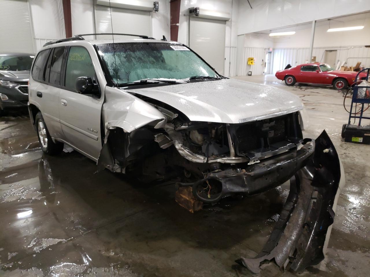 GMC ENVOY 2006 with VIN 1GKDT13SX62355562 - Photo from auction