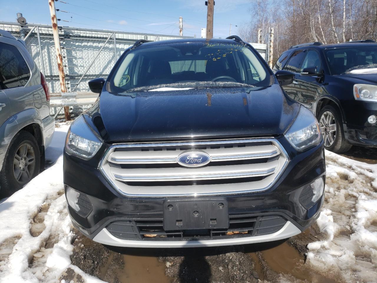 Photo 9 from auction – 2018 FORD ESCAPE SE with VIN 1FMCU9GD7JUB16851