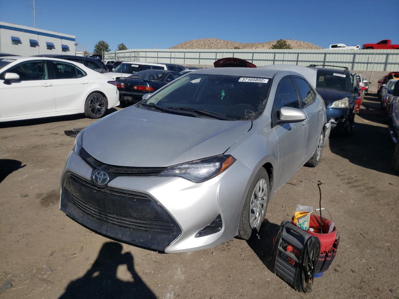 Photo 2 from auction – 2017 TOYOTA COROLLA L with VIN 5YFBURHE8HP569374