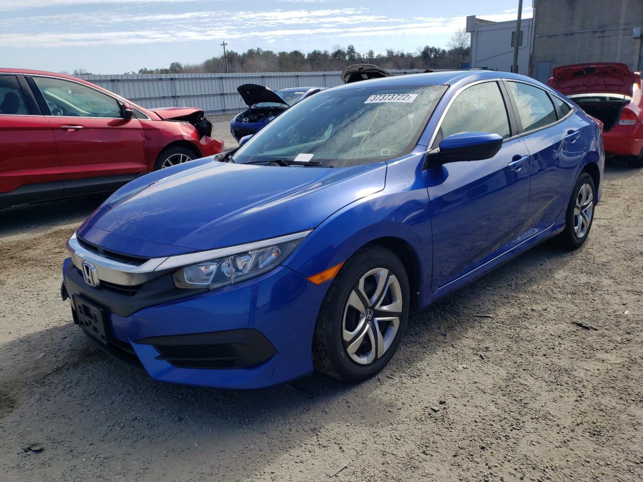 Photo 2 from auction – 2018 HONDA CIVIC LX with VIN 2HGFC2F57JH604028