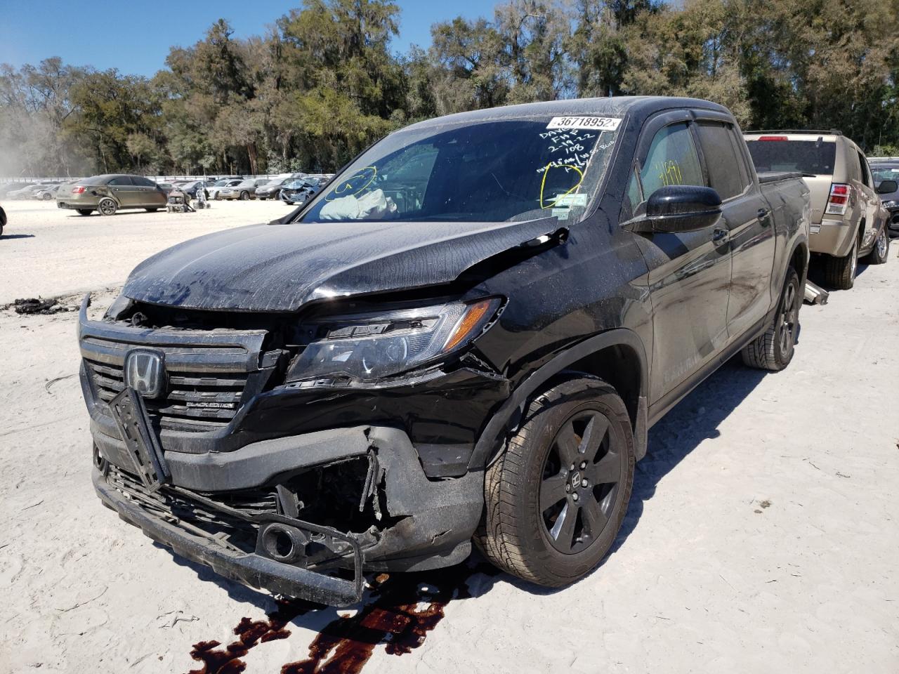 Photo 2 from auction – 2019 HONDA RIDGELINE with VIN 5FPYK3F80KB017324