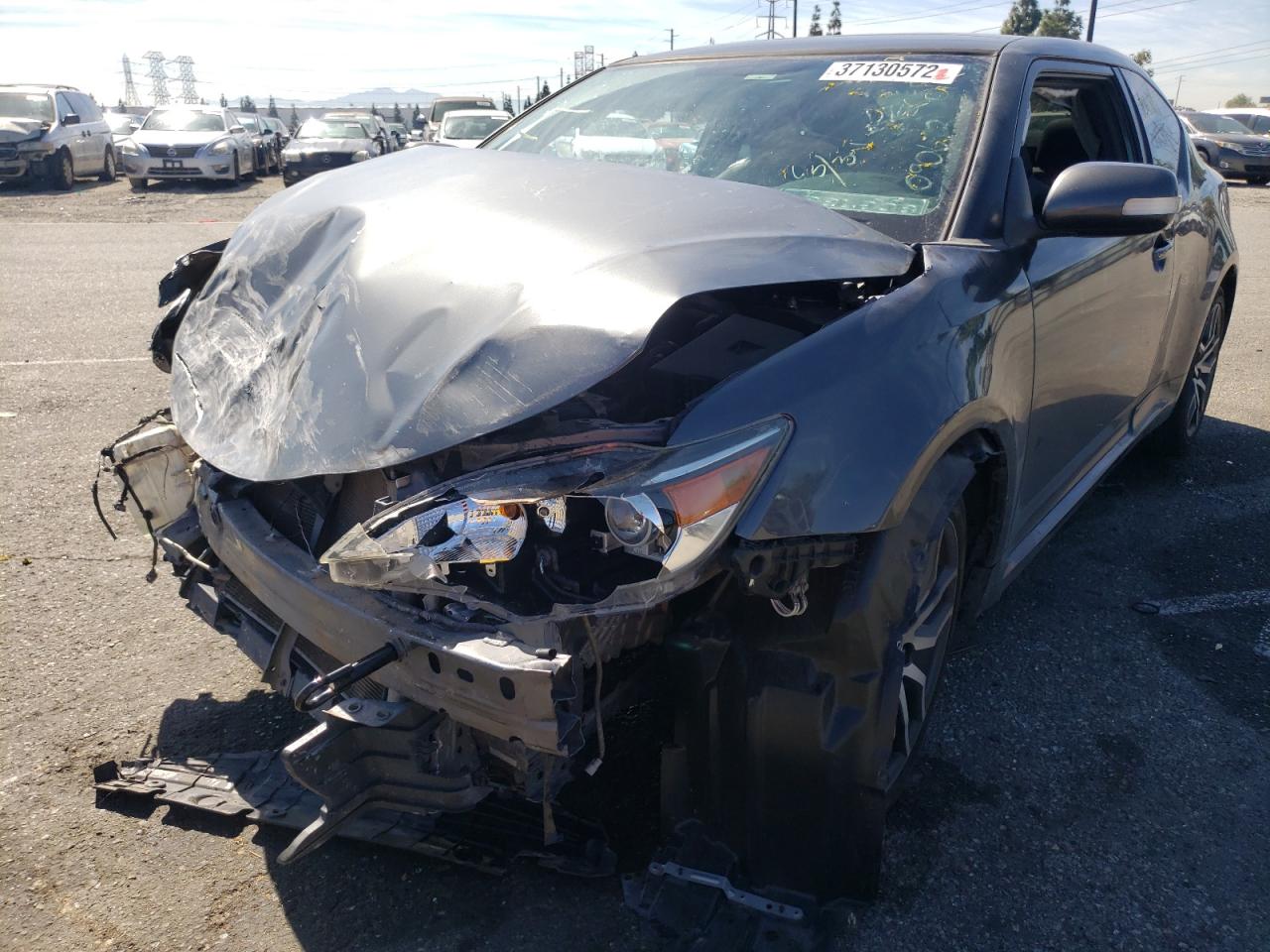 Photo 2 from auction – 2015 TOYOTA SCION TC with VIN JTKJF5C71F3090672