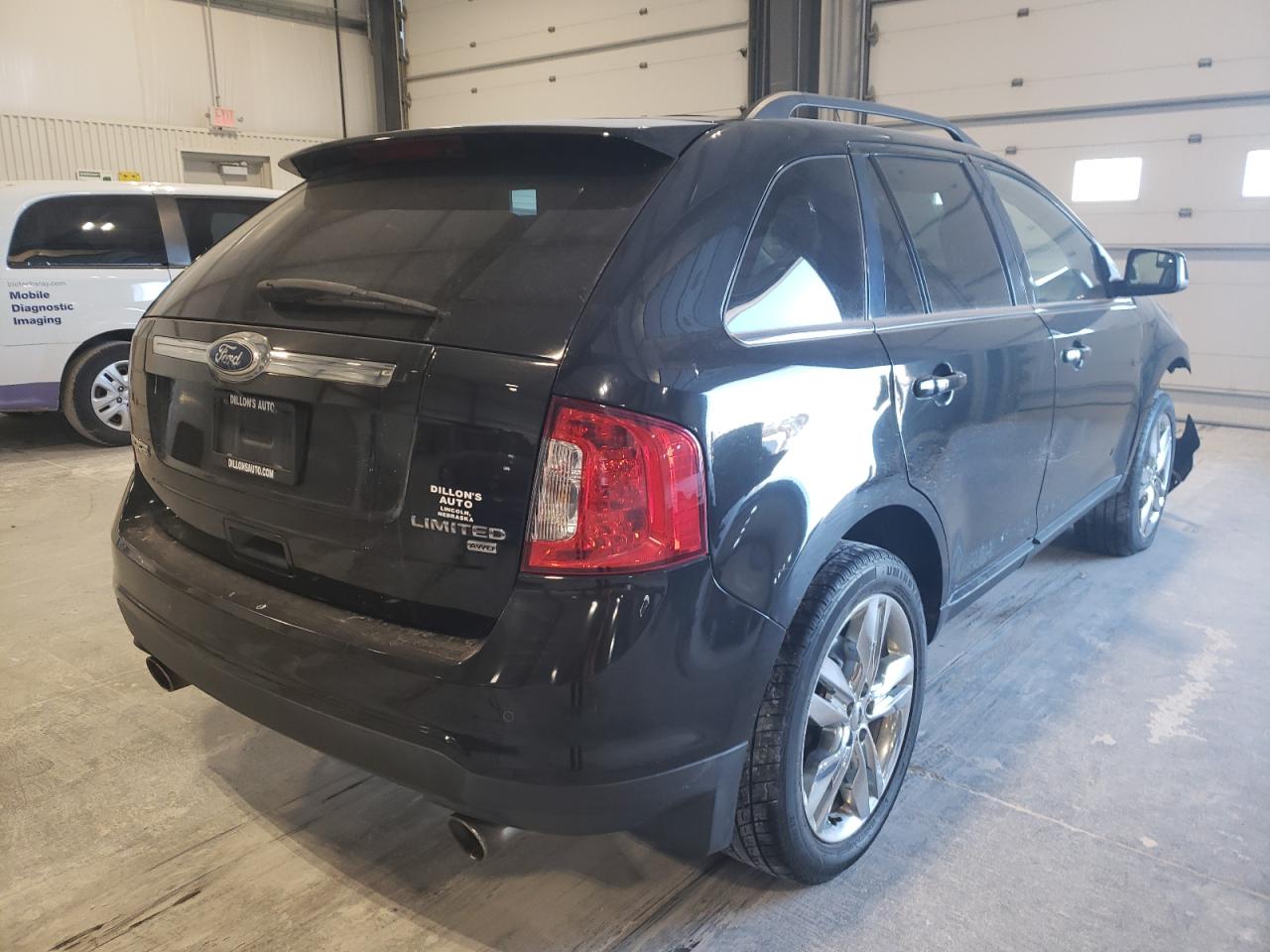 Photo 4 from auction – 2011 FORD EDGE LIMIT with VIN 2FMDK4KC9BBA05642