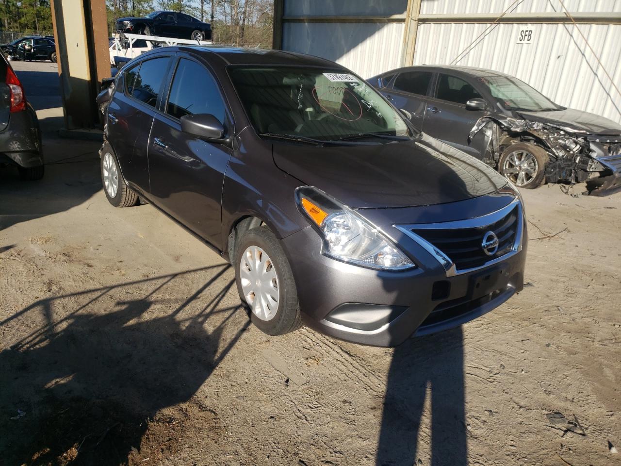 NISSAN VERSA S 2017 with VIN 3N1CN7AP9HL879454 - Photo from auction