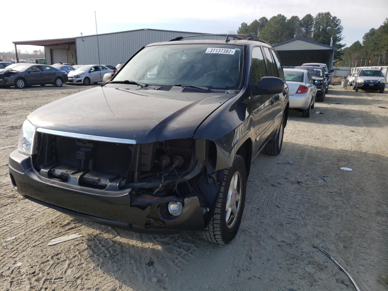 Photo 2 from auction – 2006 GMC ENVOY with VIN 1GKDS13S562163212
