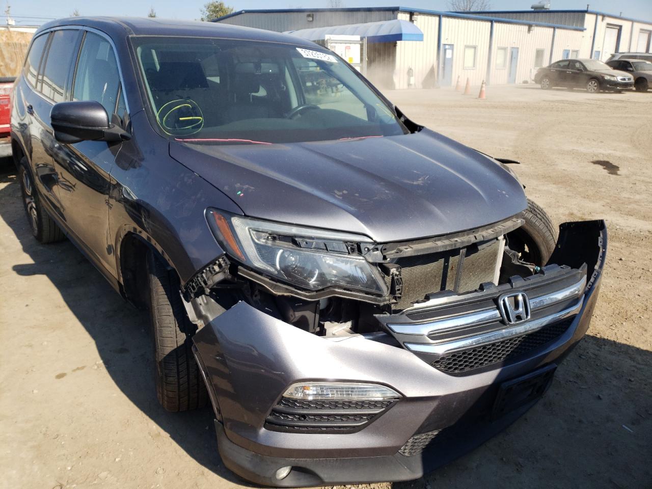 HONDA PILOT EXLN 2016 with VIN 5FNYF6H73GB101065 - Photo from auction