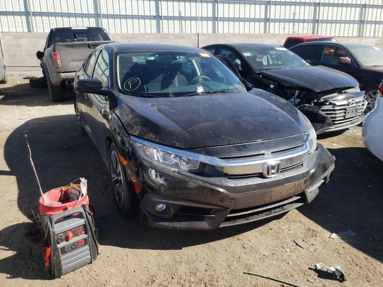 HONDA CIVIC EX 2017 with VIN 2HGFC1F39HH656117 - Photo from auction