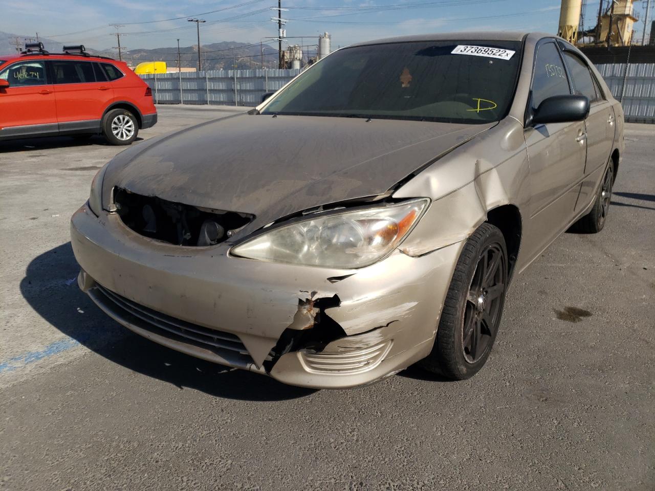 Photo 9 from auction – 2004 TOYOTA CAMRY LE with VIN JTDBE32K640289093