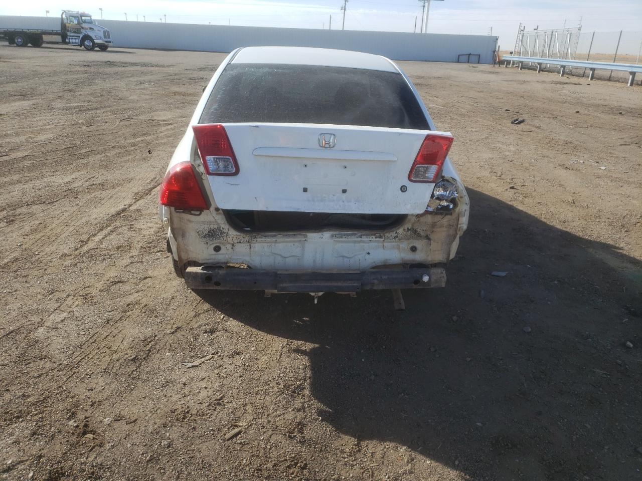 Photo 9 from auction – 2004 HONDA CIVIC LX with VIN 2HGES16554H635033