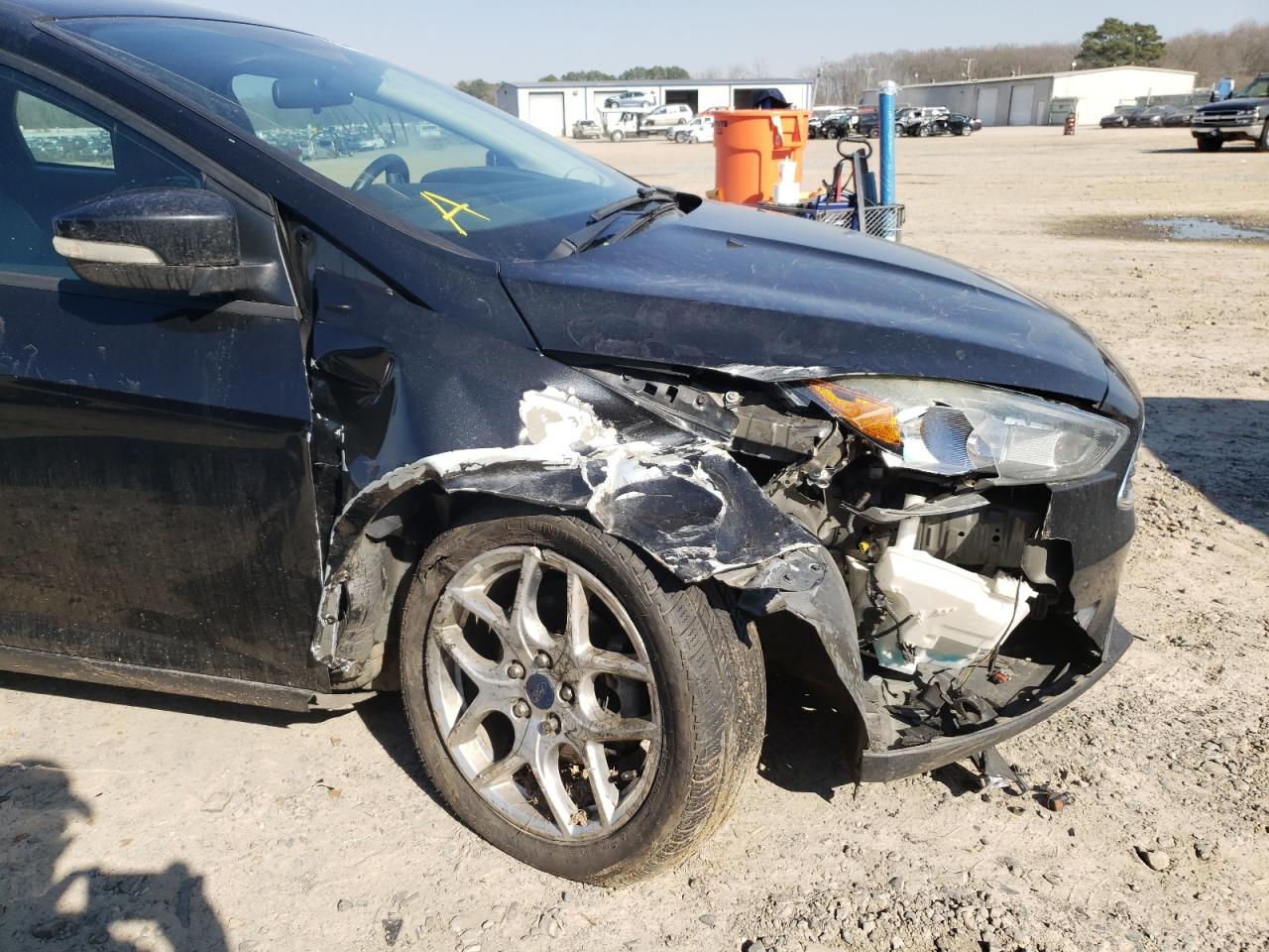 Photo 9 from auction – 2015 FORD FOCUS SE with VIN 1FADP3F20FL267661
