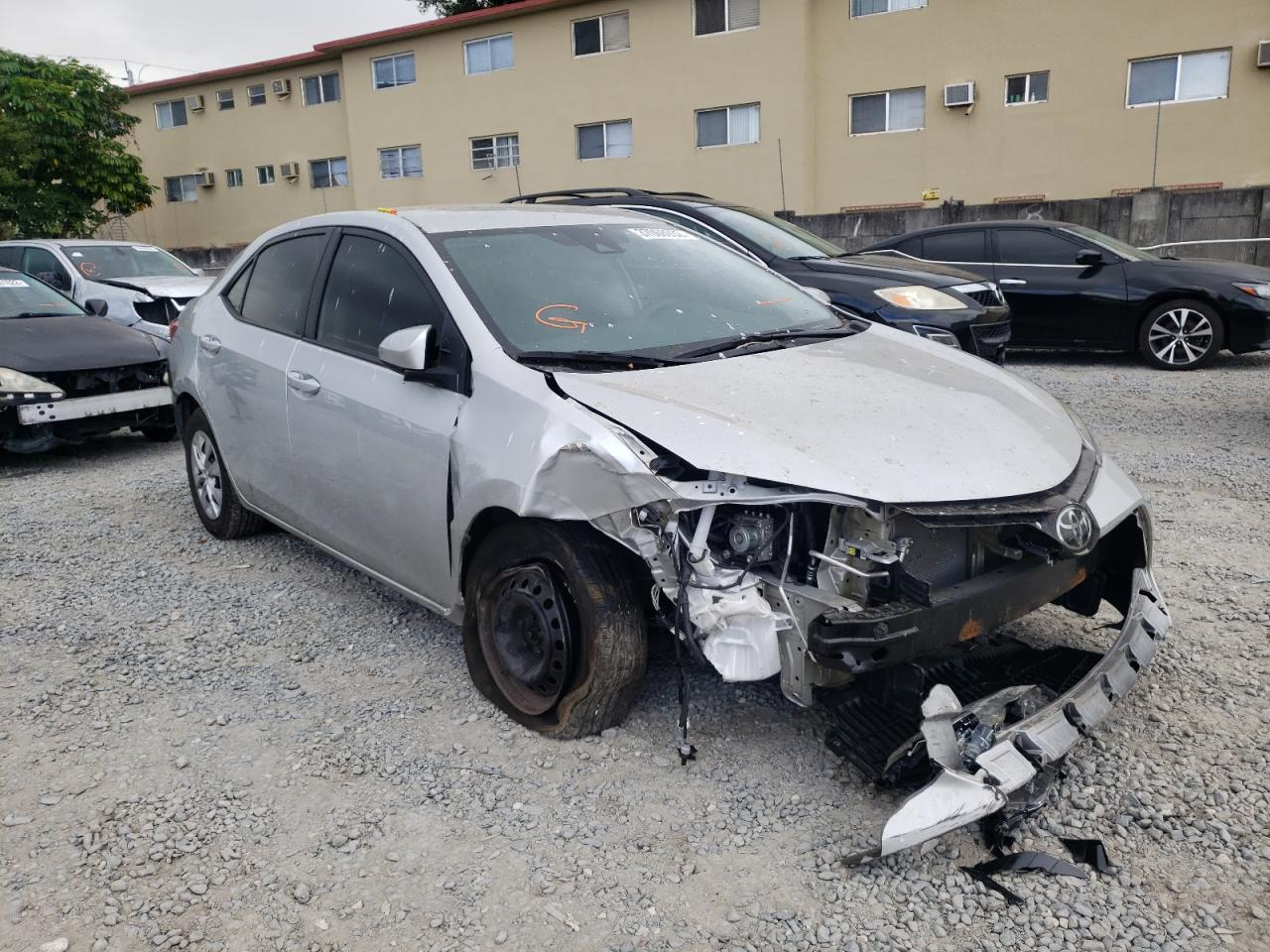 TOYOTA COROLLA L 2019 with VIN 5YFBURHE1KP942360 - Photo from auction