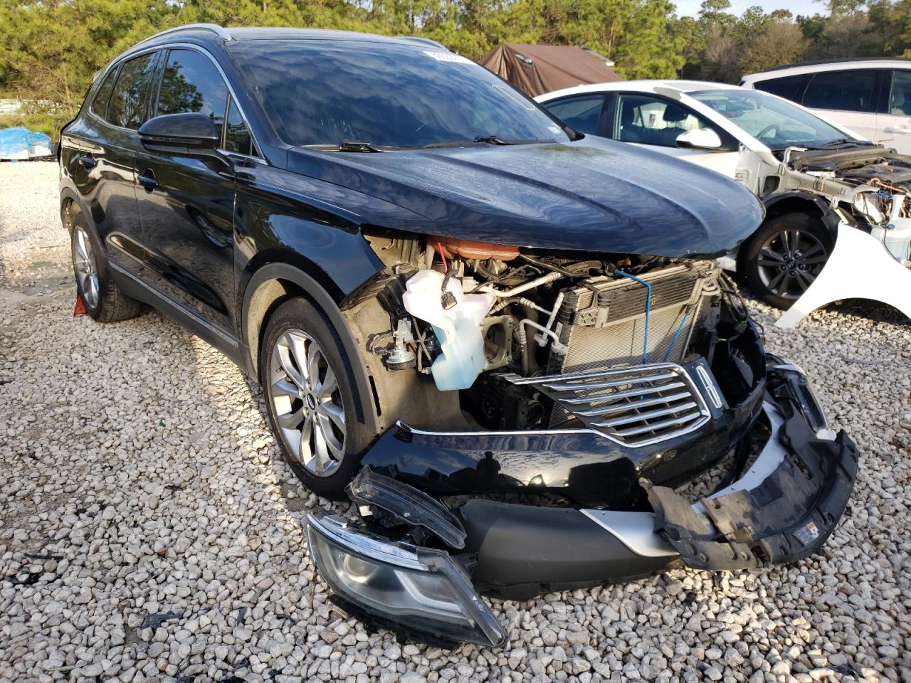 LINCOLN MKC 2015 with VIN 5LMCJ1A93FUJ07809 - Photo from auction