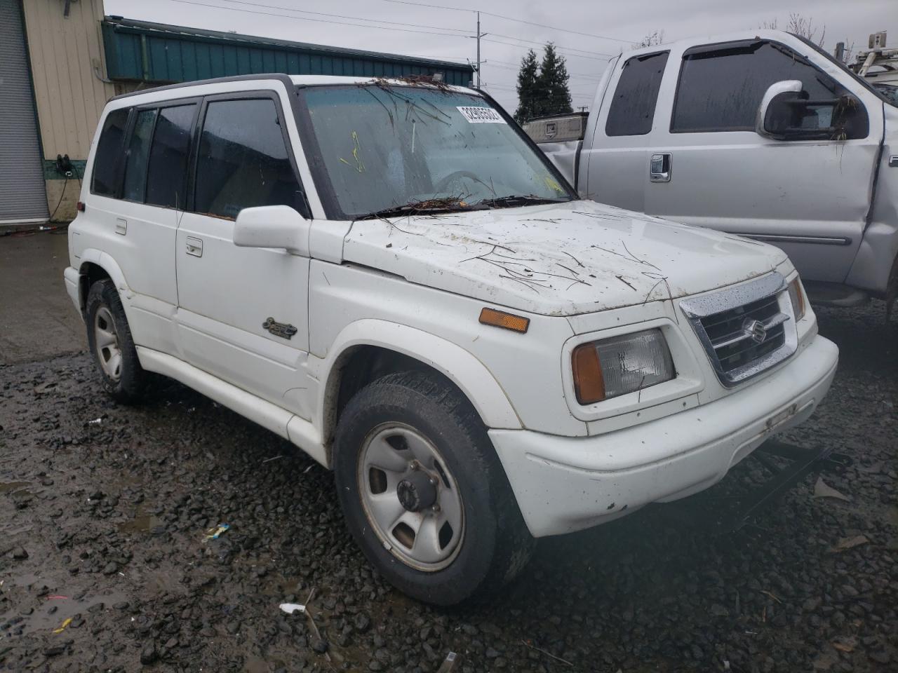SUZUKI SIDEKICK S 1998 with VIN JS3TD21V8W4106691 - Photo from auction