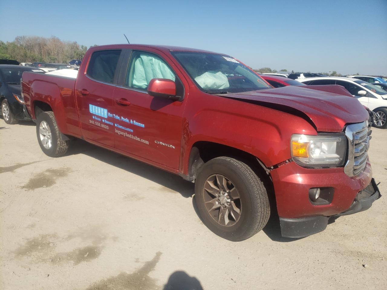 GMC CANYON SLE 2015 with VIN 1GTG5BE33F1140674 - Photo from auction