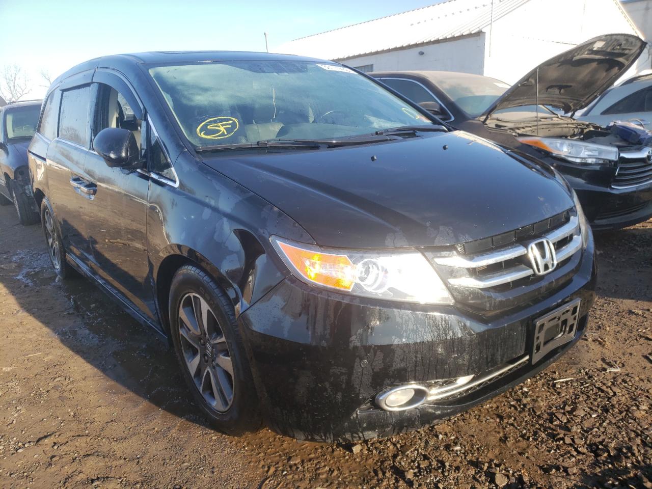 HONDA ODYSSEY TO 2014 with VIN 5FNRL5H97EB029034 - Photo from auction