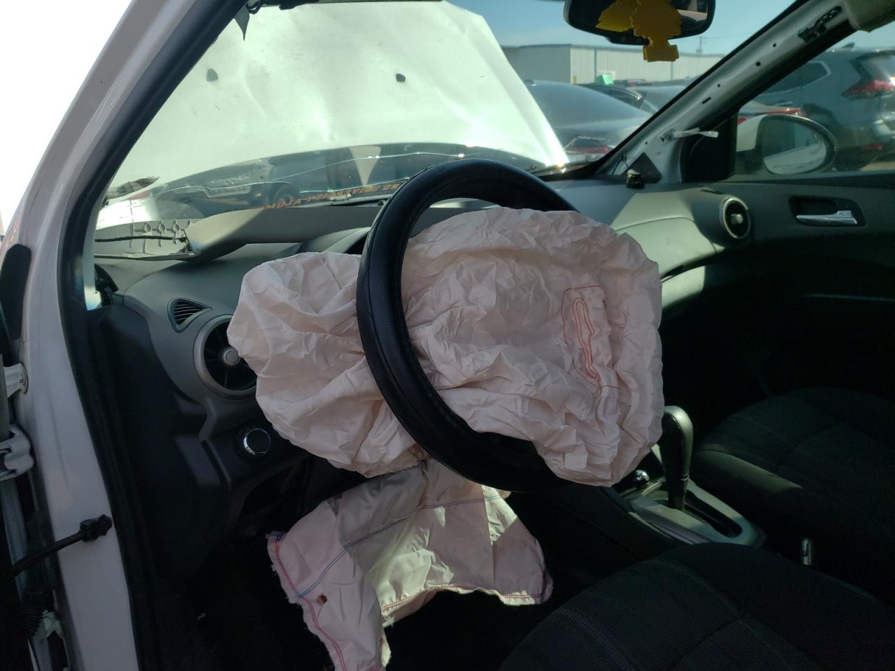 Photo 9 from auction – 2013 CHEVROLET SONIC LT with VIN 1G1JC6SH8D4255097