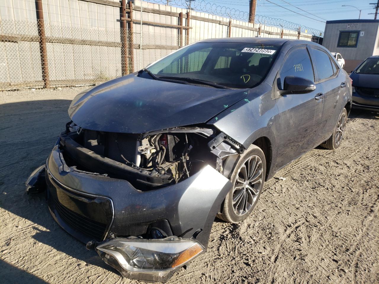 Photo 2 from auction – 2014 TOYOTA COROLLA L with VIN 5YFBURHE5EP137644