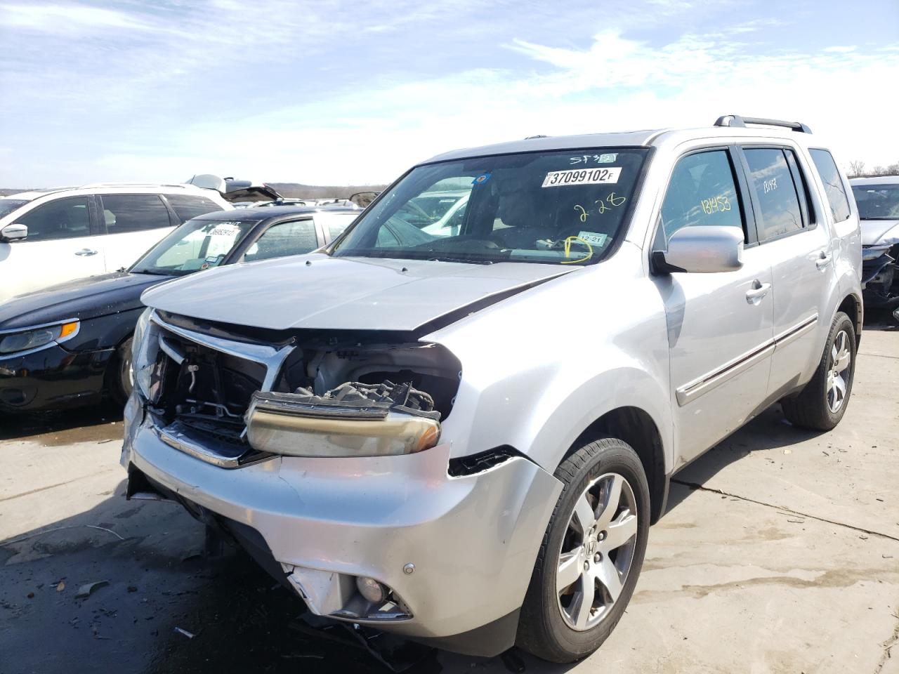 Photo 2 from auction – 2014 HONDA PILOT TOUR with VIN 5FNYF4H91EB011951