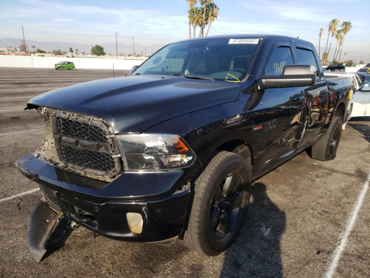 Photo 2 from auction – 2018 RAM 1500 SLT with VIN 1C6RR7LM6JS290620