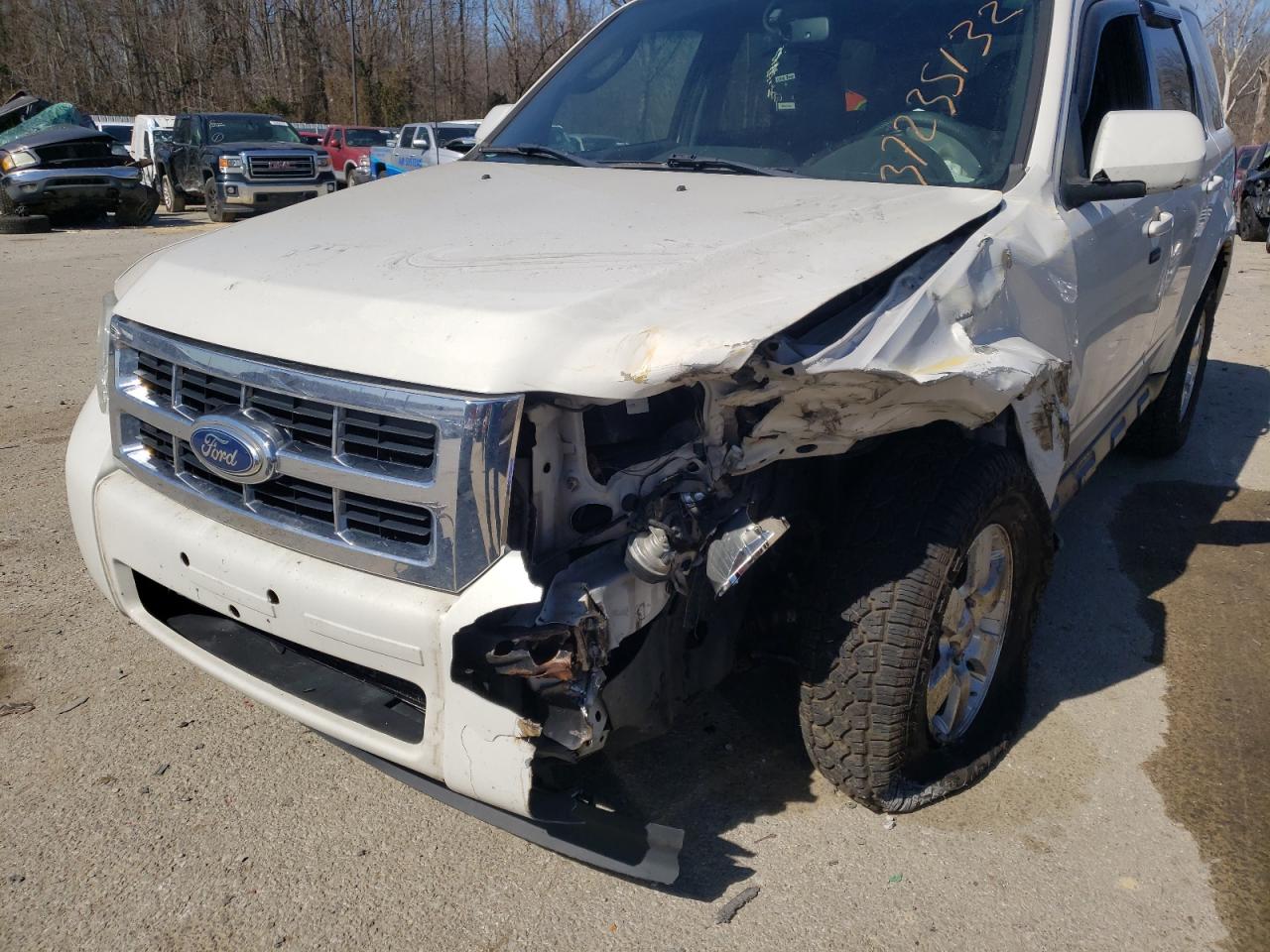 Photo 9 from auction – 2011 FORD ESCAPE LIM with VIN 1FMCU0E71BKB38950