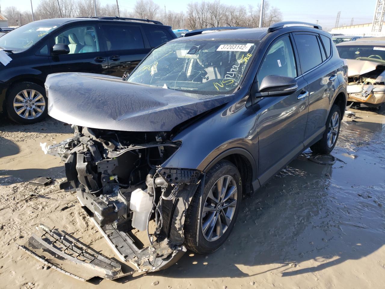 Photo 2 from auction – 2018 TOYOTA RAV4 LIMIT with VIN JTMDFREV1JJ736613