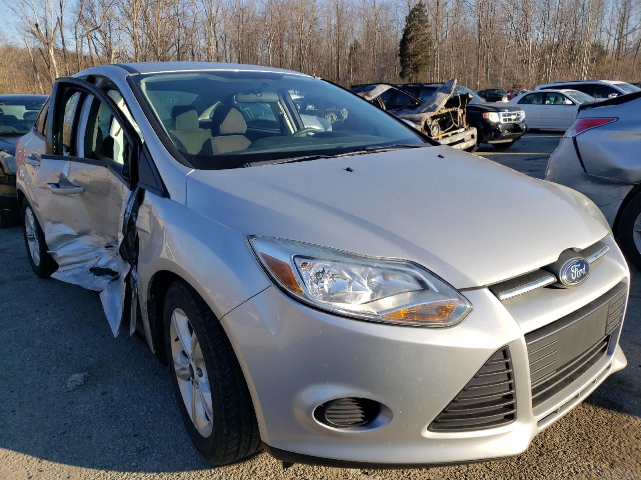 FORD FOCUS SE 2014 with VIN 1FADP3F20EL194368 - Photo from auction