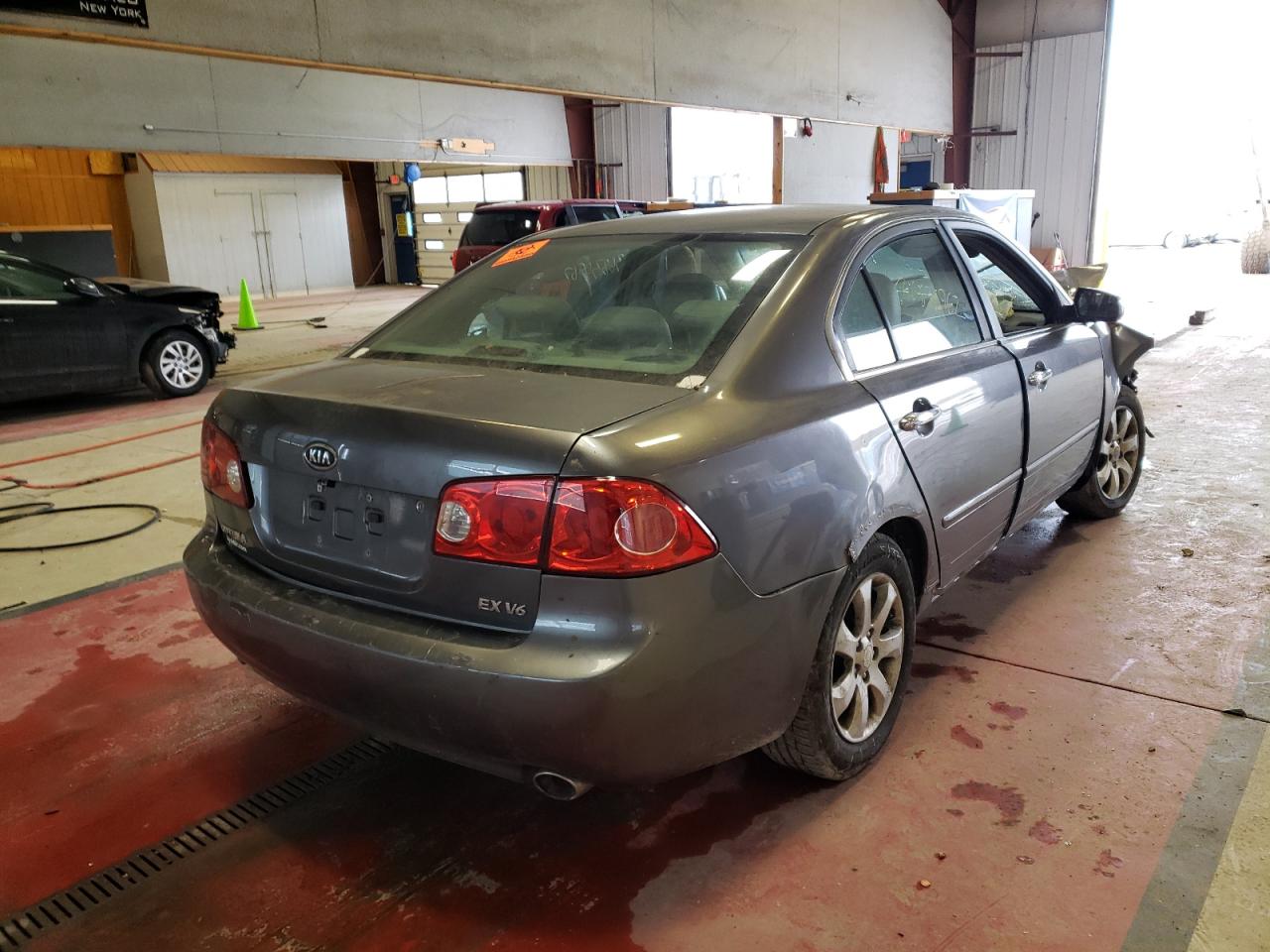 Photo 4 from auction – 2007 KIA OPTIMA LX with VIN KNAGE124575118223