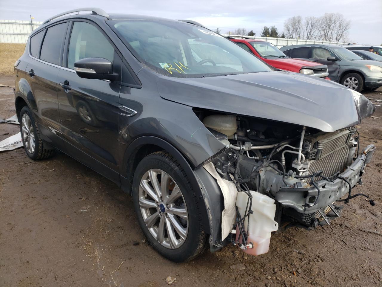 FORD ESCAPE 2018 with VIN 1FMCU0J99JUC32844 - Photo from auction