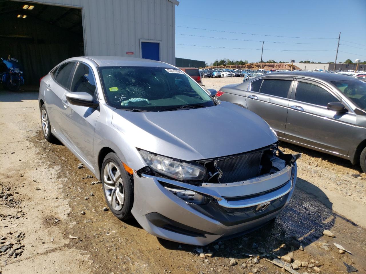 HONDA CIVIC LX 2017 with VIN 19XFC2F54HE025695 - Photo from auction