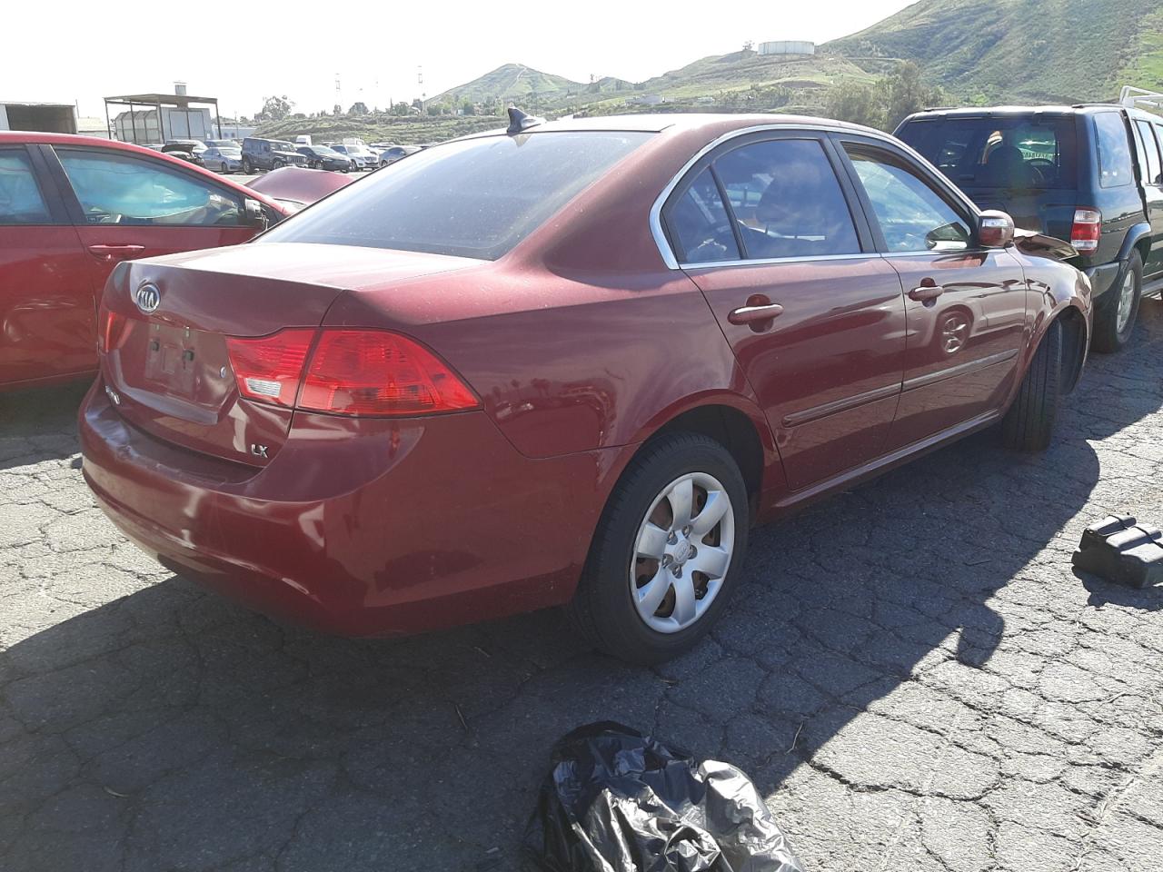 Photo 4 from auction – 2009 KIA OPTIMA LX with VIN KNAGE228695326106
