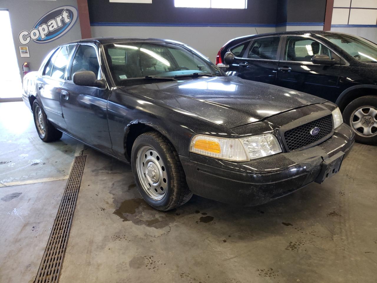 FORD CROWN VICT 2011 with VIN 2FABP7BV4BX133537 - Photo from auction