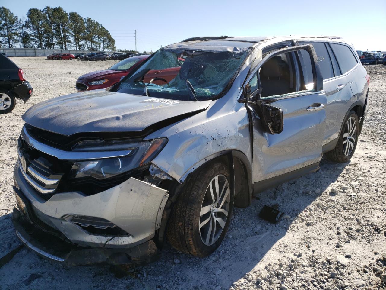 Photo 2 from auction – 2016 HONDA PILOT TOUR with VIN 5FNYF5H98GB031087