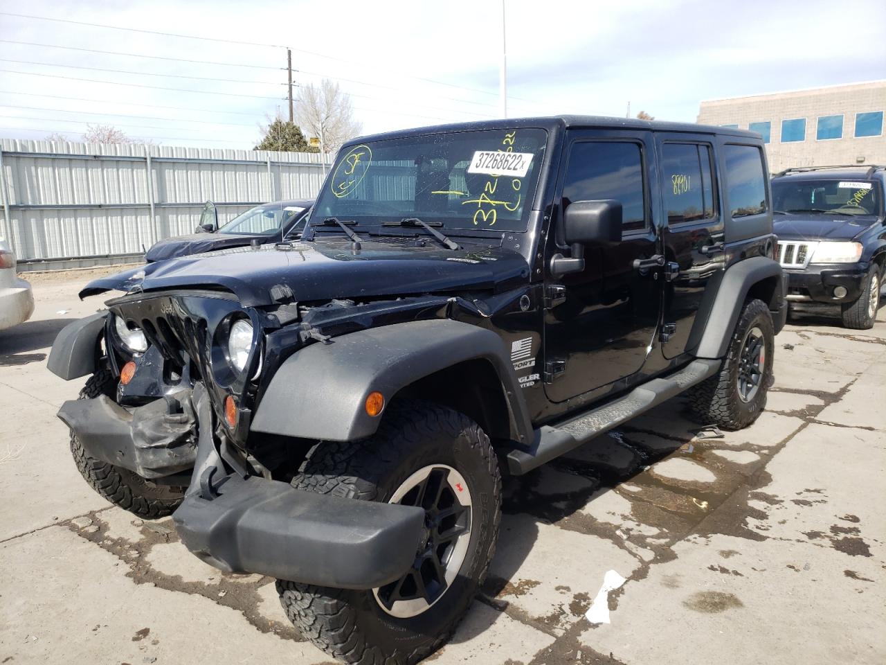 Photo 2 from auction – 2012 JEEP WRANGLER U with VIN 1C4BJWDG4CL222527